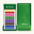 SUTCAY mixed-color lash tray and green lid on a warm white background